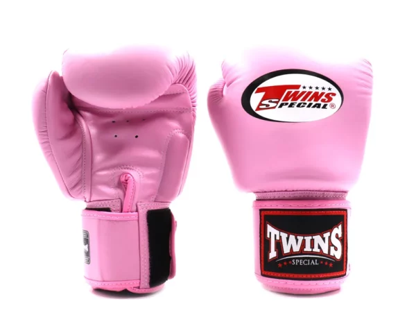 Gants de boxe Twins rose la plus connue et la plus vendue de chez Twins, sont conçus pour une protection maximale de la main et du poignet. incontestablement l'une des paires de gants les plus vendues au monde