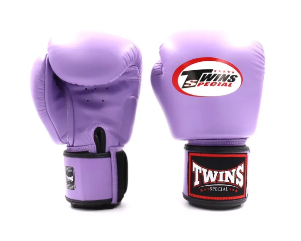 Gants de boxe Twins violet la plus connue et la plus vendue de chez Twins, sont conçus pour une protection maximale de la main et du poignet. incontestablement l'une des paires de gants les plus vendues au monde