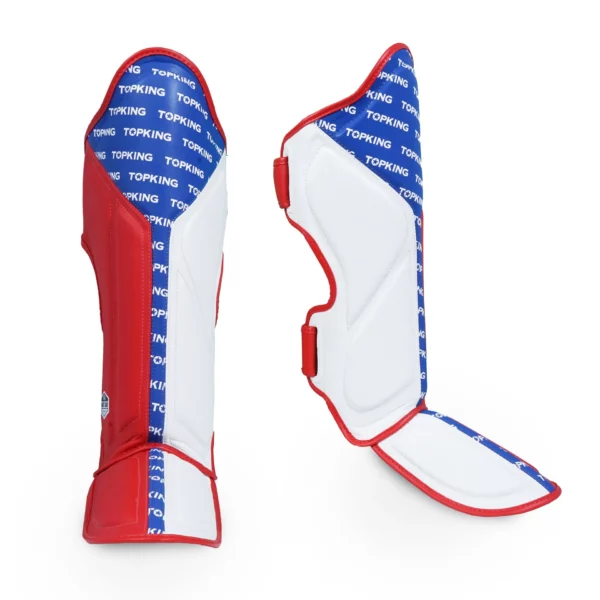 Les protège-tibias Top King Shin Guard Full Impact Triple Tone offrent une protection exceptionnelle avec un rembourrage en mousse haute densité et un cuir de qualité. Idéals pour le Muay Thai et le MMA, ils assurent confort et sécurité. Disponibles en plusieurs tailles et couleurs